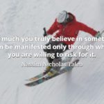 Man in red jacket skiing down a very steep slope and Nassim Nicholas Taleb quote: How much you tryly believe in something can be manifested only through what you are will to risk for it.